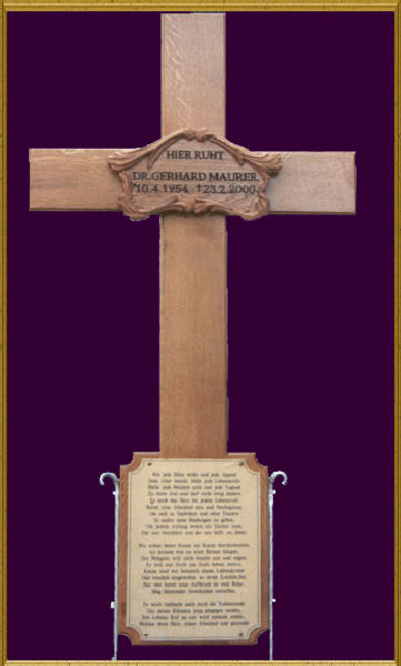 Simple cross of oak with brass plaque