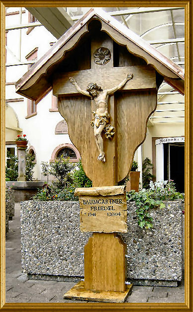 Grave cross made of oak with painted wooden statue of Christ