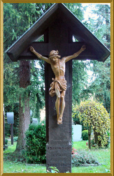 cemetery cross with christ`s boddy