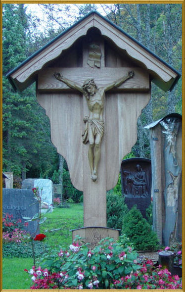 Simple wooden cross with body Jesus